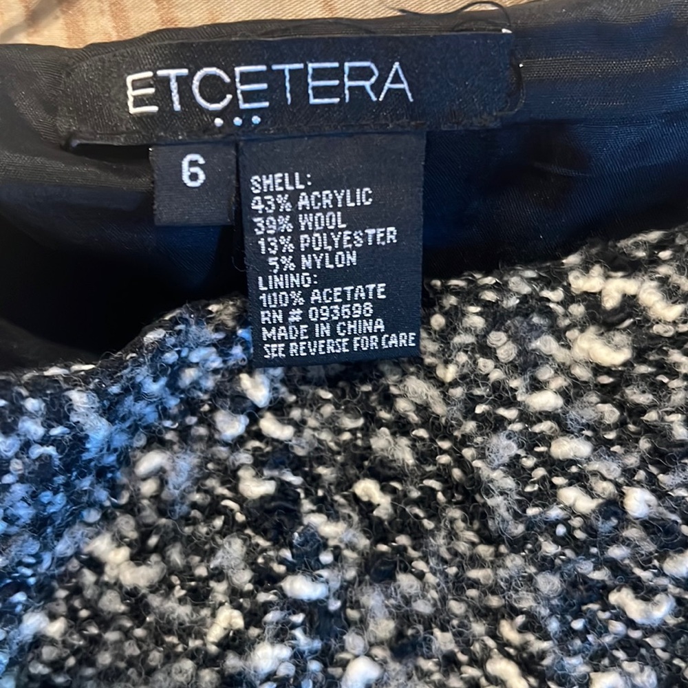 Beautifully tailored black and white tweed by etcetera.
